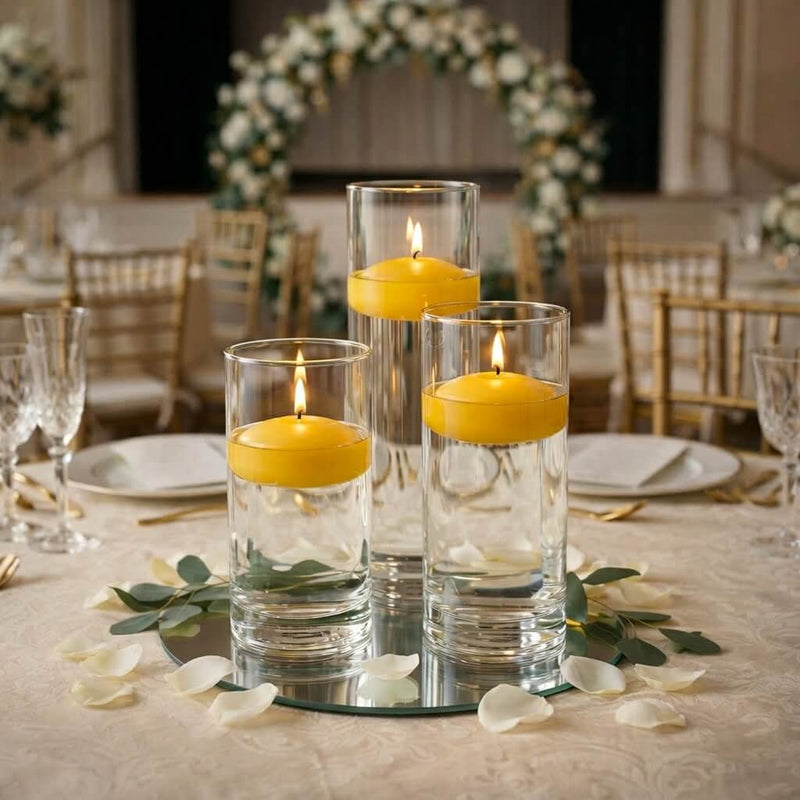 Wedding table centerpiece with three floating candles in glass cylinders - thumbnail number 7