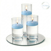 Eastland Round Mirror and Cylinder Vase Centerpiece with Richland 3" Floating Candles Set of 7 - thumbnail number 27