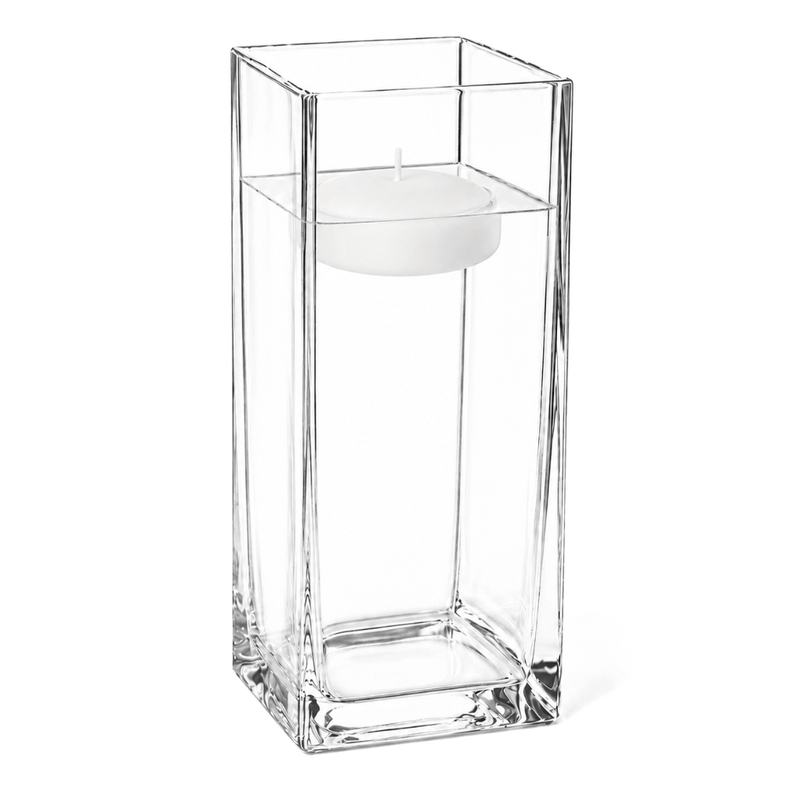 An unlit floating white candle in the Square Vase 12" isolated on a solid white background - thumbnail number 2