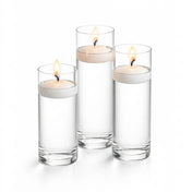 Three white floating candles in tall glass cylinders - thumbnail number 2
