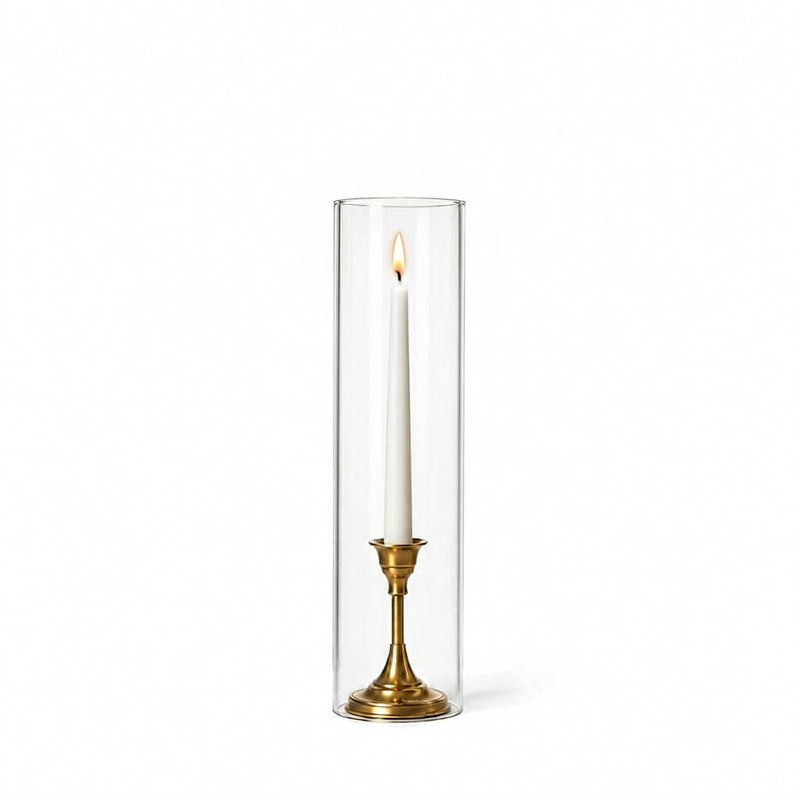 Lit white taper in a gold holder with a 4" x 16" chimney glass candle shade - thumbnail number 3
