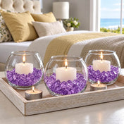 Lit candles in glass bowls filled with purple acrylic ice beads on a tray in a bedroom setting - thumbnail number 8