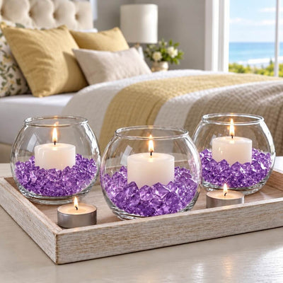 Lit candles in glass bowls filled with purple acrylic ice beads on a tray in a bedroom setting - thumbnail number 8