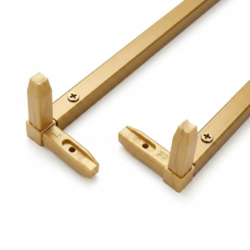 Close-up of gold metal frame corners with L and R marked plastic connectors - thumbnail number 3