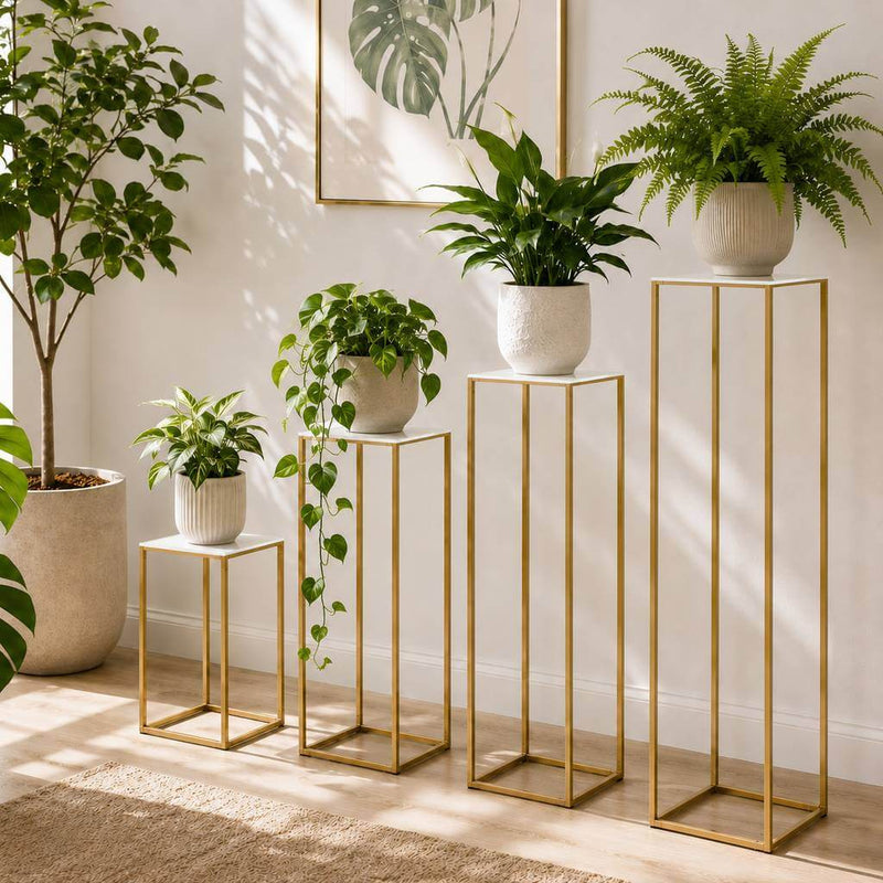 Four gold metal stands with white acrylic tops and potted plants of varying heights - thumbnail number 10