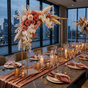 Gold metal arch stand over a modern table with floral arrangements and candles - thumbnail number 7