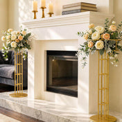 Gold metal floral risers holding pastel floral arrangements by a fireplace - thumbnail number 7