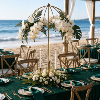 Gold metal umbrella flower stand centerpiece with white orchids and candles at a beach wedding - thumbnail number 3