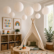 White paper lanterns hanging from the ceiling in a decorated child's playroom - thumbnail number 7