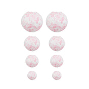 Set of white paper lanterns with pink floral print in various sizes on white background - thumbnail number 1
