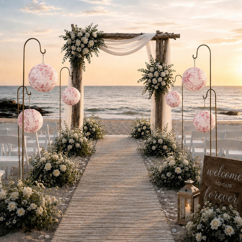French toile paper lanterns decorate beach wedding arch aisle - thumbnail number 4