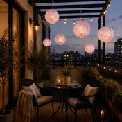 Pink floral French toile paper lanterns hanging over a balcony - thumbnail number 8