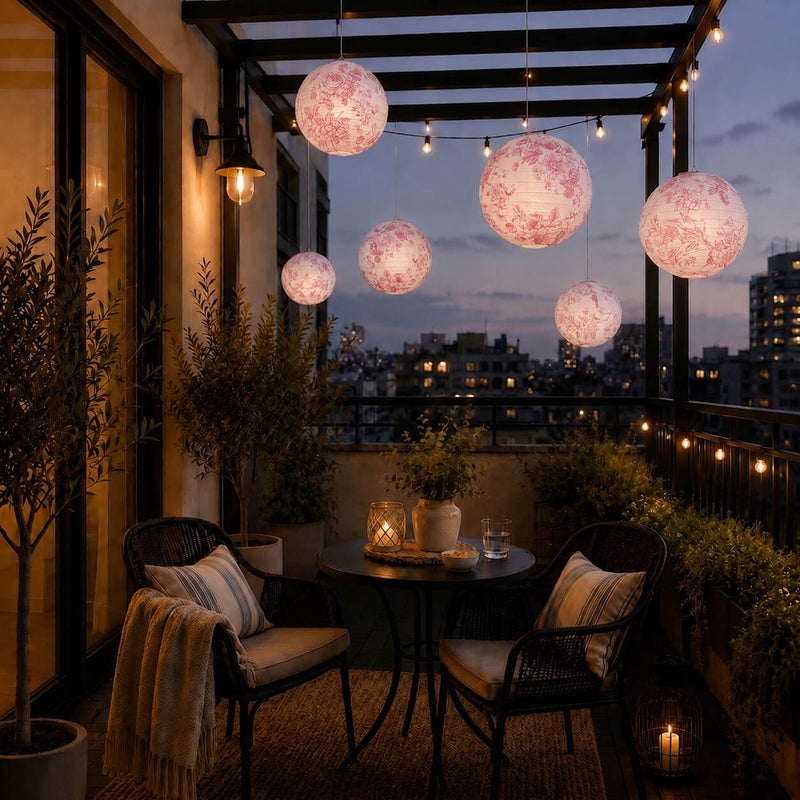 Pink floral French toile paper lanterns hanging over a balcony - thumbnail number 8