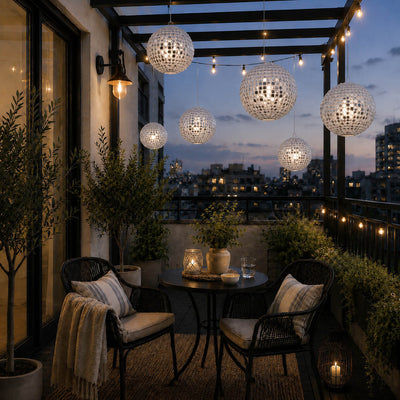 Hanging silver payette sequin lanterns over a cozy balcony at dusk - thumbnail number 10