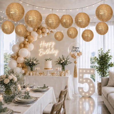 Hanging gold sequin lanterns decorating a birthday party setup - thumbnail number 2