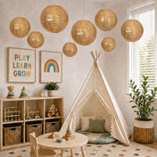 Hanging gold sequin lanterns decorating a child's playroom with a teepee - thumbnail number 8