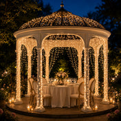 Warm white 300 LED icicle string lights decorating an outdoor dining gazebo at night - thumbnail number 7