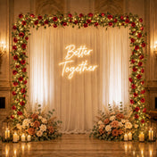 A 7ft red silk rose flower garland with 20 LED string lights framing a wedding backdrop - thumbnail number 5