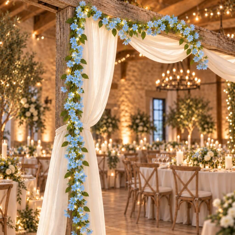 Blue jasmine flower garland with fairy lights decorating a venue archway - thumbnail number 5