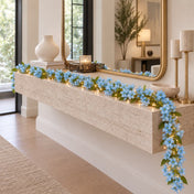 Blue jasmine flower garland with fairy lights on a mantelpiece - thumbnail number 8