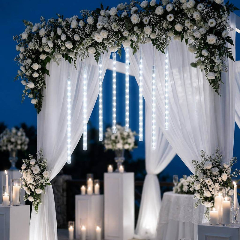 Hanging LED meteor shower string lights decorating a wedding arch - thumbnail number 5