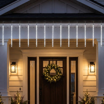 Hanging LED meteor shower string lights illuminating a house entryway - thumbnail number 7