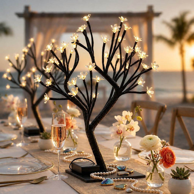 Black artificial cherry blossom tree centerpiece with LED lights for a beach wedding - thumbnail number 4