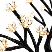 Close-up of black branches with glowing warm white LED cherry blossom flowers - thumbnail number 3
