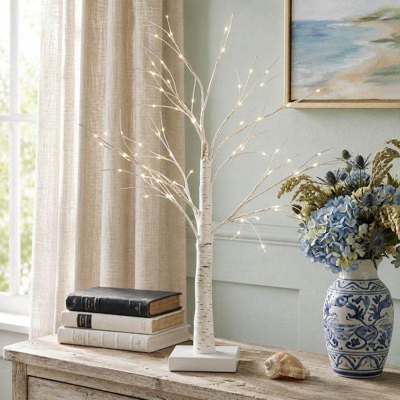 Lighted 2ft birch tree with warm LED lights on a table next to books and a flower vase - thumbnail number 7