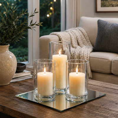 Three lit pillar candles in glass holders on a square mirror tray - thumbnail number 7