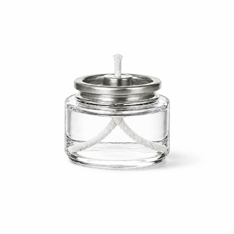 Unlit Liquid Paraffin Fuel Cell in clear glass container with white wick and silver top - thumbnail number 1