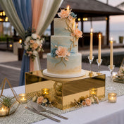 Gold mirror finish acrylic riser displaying a multi-tier wedding cake decorated with floral accents - thumbnail number 4