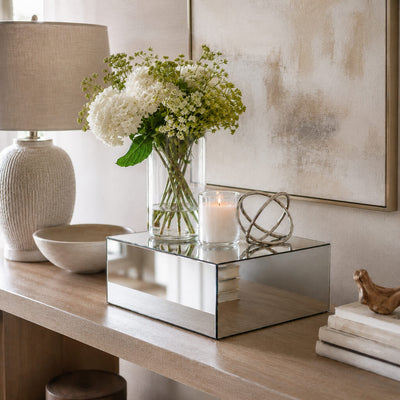 Silver mirror finish acrylic pedestal riser styled with a vase of white flowers and a candle - thumbnail number 7