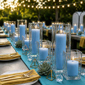 Lit light blue candle and square holder decor on a turquoise runner for an outdoor event - thumbnail number 5
