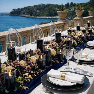 Black pillar candles in glass holders on a coastal banquet table - thumbnail number 3