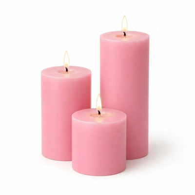 Three pink candles of different sizes on a white background - thumbnail number 2