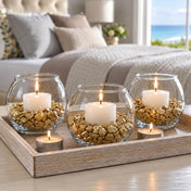 Glass globes with candles and metallic gold stones on a wooden tray - thumbnail number 5