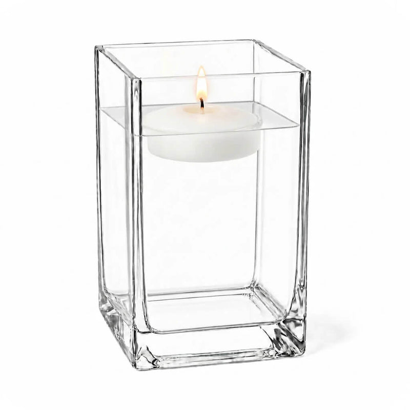 Clear 6" square vase filled with water and a lit floating candle - thumbnail number 5