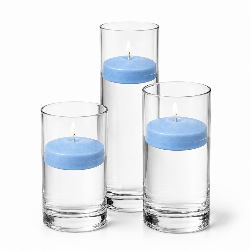 Three lit blue floating candles inside glass cylinder vases - thumbnail number 1