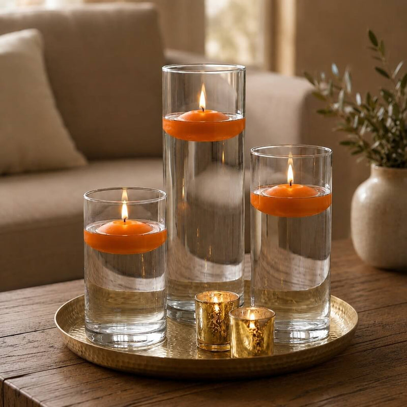 Three glass cylinders with floating orange candles on a tray - thumbnail number 6