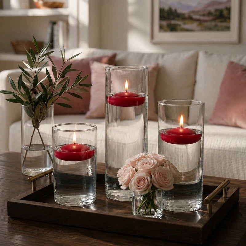Lit red floating candles in glass cylinders on a tray with pink roses - thumbnail number 6
