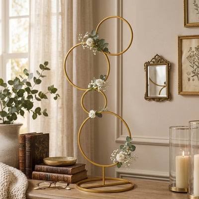 Gold metal 4-tier hoop pillar stand decorated with white flowers - thumbnail number 9