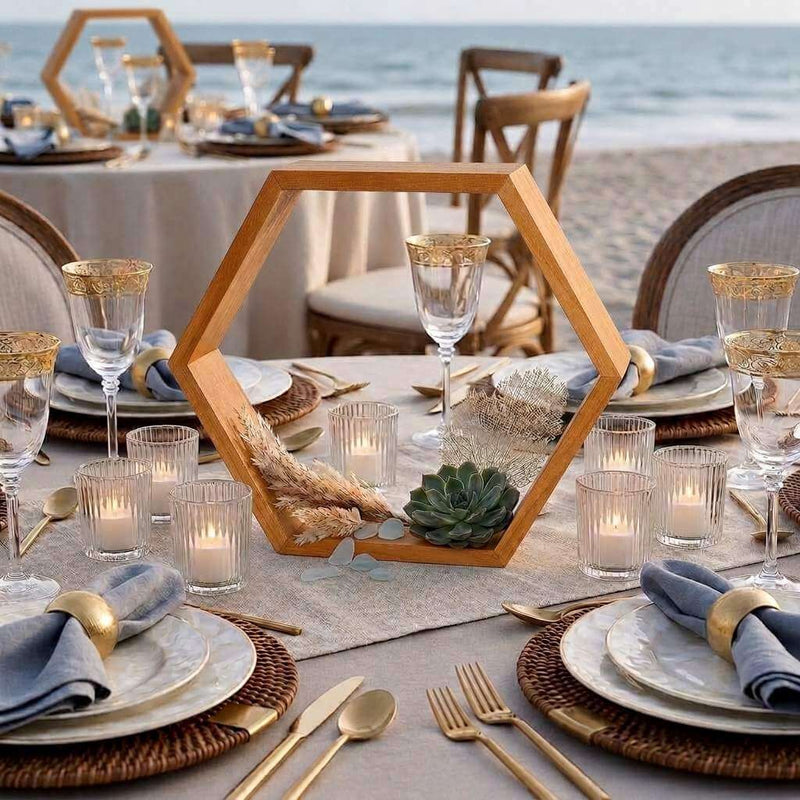 Rustic wood hexagon display frame used as a beach wedding centerpiece with candles and succulents - thumbnail number 5