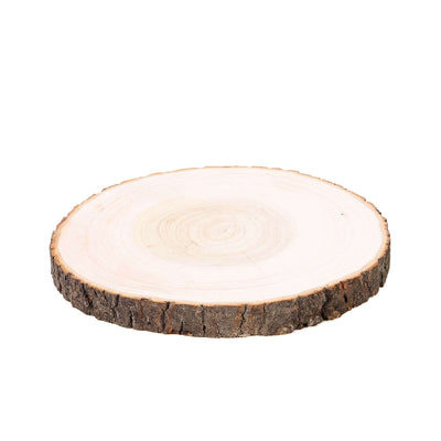 Round natural wood slice with bark edge for rustic decor on a white background - thumbnail number 1