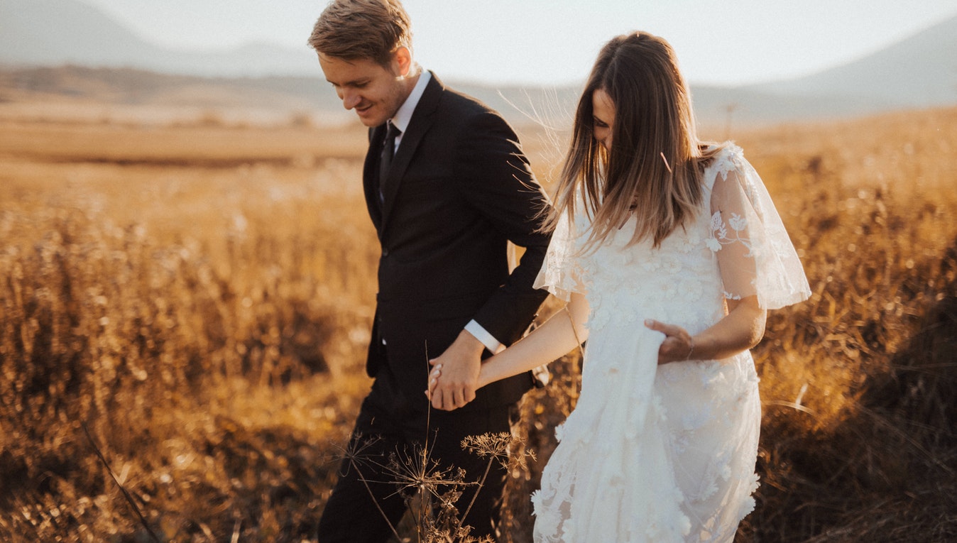 bride & groom in field
