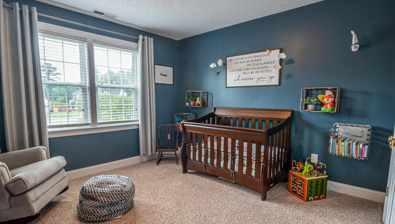 Nursery with dark sales furniture