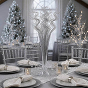 Silver sparkle curly ting stems in a glass vase on a holiday table - thumbnail number 5