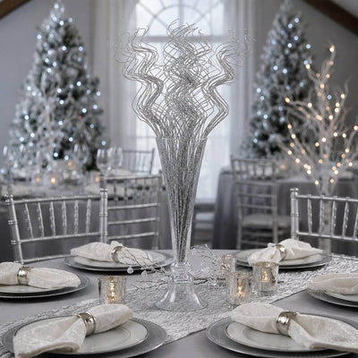Silver sparkle curly ting stems in a glass vase on a holiday table - thumbnail number 5