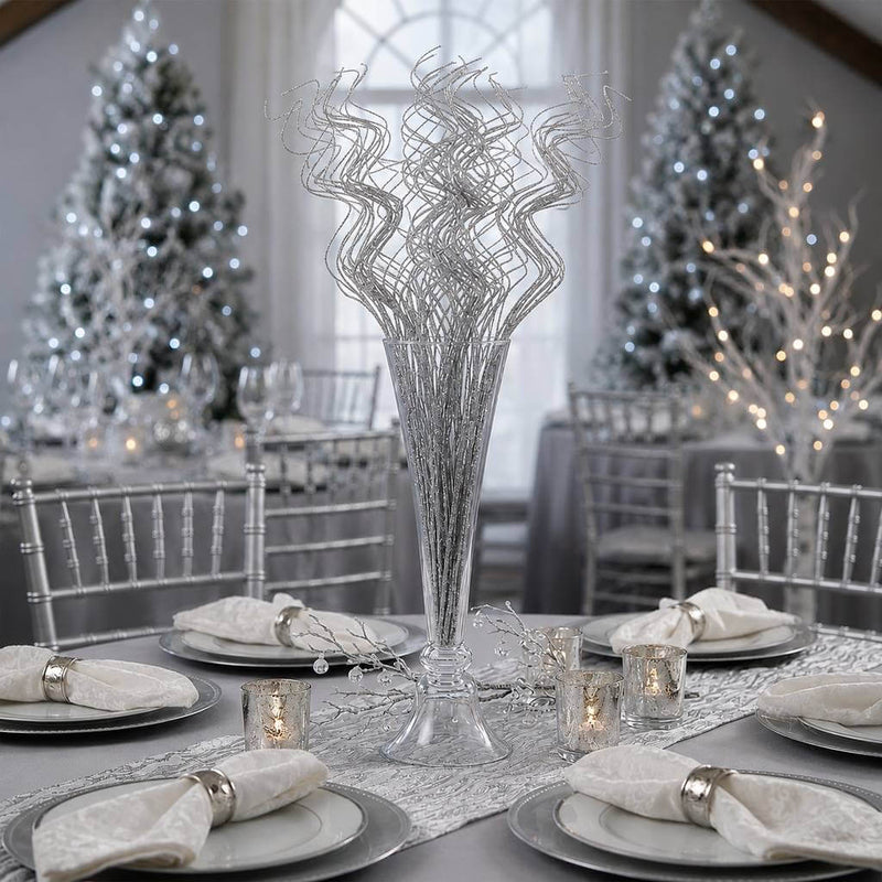 Silver sparkle curly ting stems in a glass vase on a holiday table - thumbnail number 5