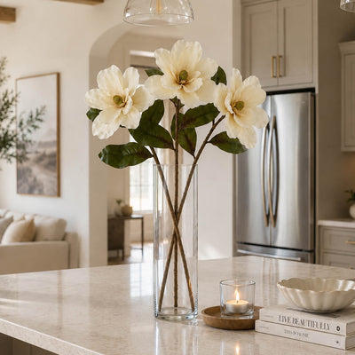 34" Deluxe Silk Magnolia Spray bouquet in a glass vase on a kitchen counter - thumbnail number 7
